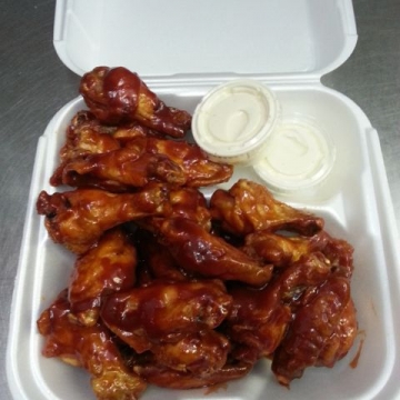 20 Piece Wings ( shown with Honey BBQ sauce)